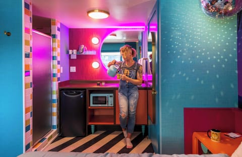 Rebel Room | Individually decorated, individually furnished, blackout drapes