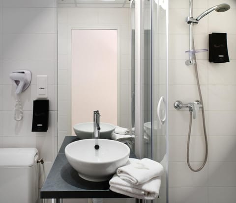 Shower, free toiletries, hair dryer, towels