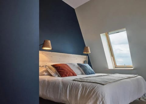 Premium bedding, desk, laptop workspace, soundproofing