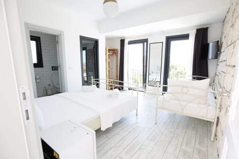 Family Triple Room, Pool View, Orkide | Premium bedding, minibar, soundproofing, iron/ironing board