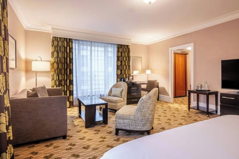 Junior Suite, 1 Queen Bed with Sofa bed | Living room | 55-inch flat-screen TV with satellite channels, TV, pay movies