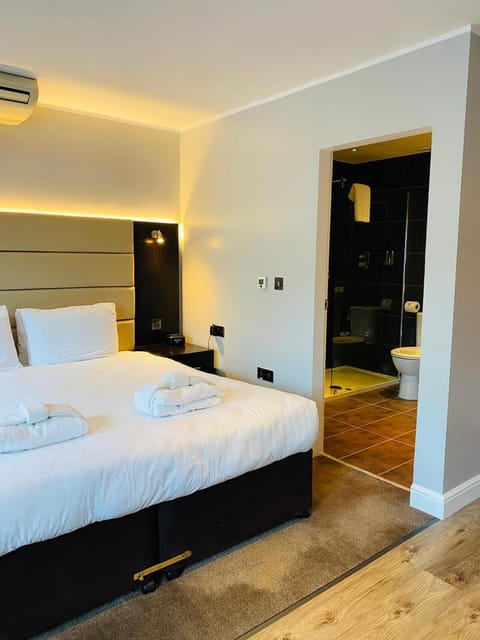 Hypo-allergenic bedding, desk, laptop workspace, iron/ironing board