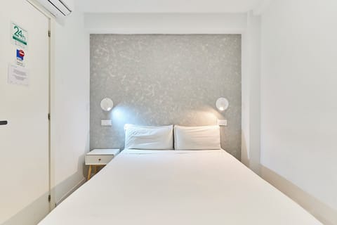 Economy Room | Premium bedding, down comforters, free WiFi, bed sheets