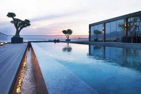 Indoor pool, seasonal outdoor pool, pool umbrellas, sun loungers