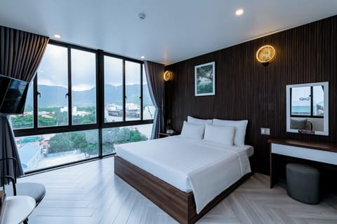 Superior Double Room | Minibar, desk, laptop workspace, blackout drapes