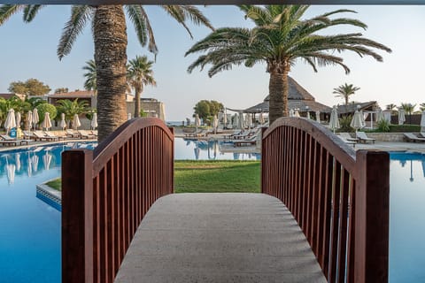 2 outdoor pools, open 10:00 AM to 6:00 PM, pool umbrellas, sun loungers