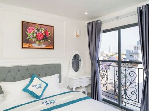 Deluxe Double Room with Balcony | Minibar, individually furnished, desk, laptop workspace