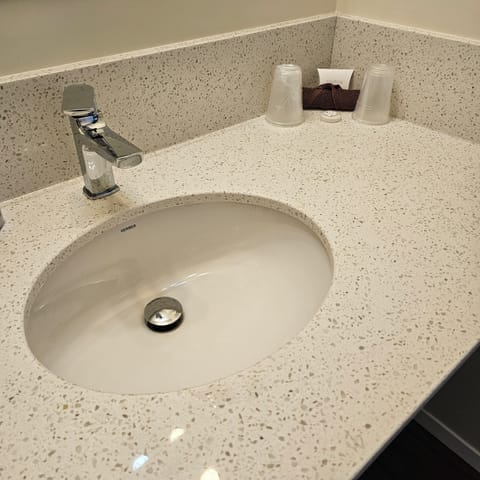 Combined shower/tub, hair dryer, towels, soap