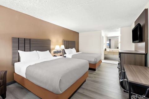 Premium bedding, pillowtop beds, desk, blackout drapes