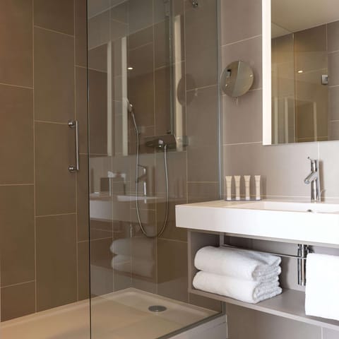 Shower, hydromassage showerhead, hair dryer, towels