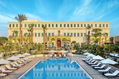 Outdoor pool, open 7:00 AM to 6:30 PM, pool umbrellas, sun loungers