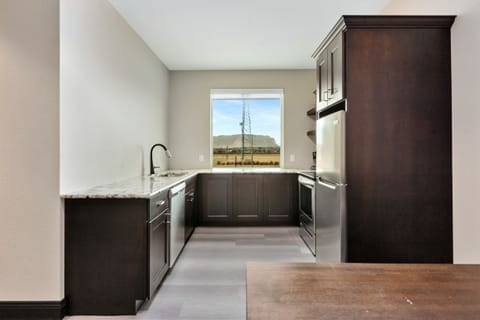 Premium Suite, Multiple Beds | Private kitchen