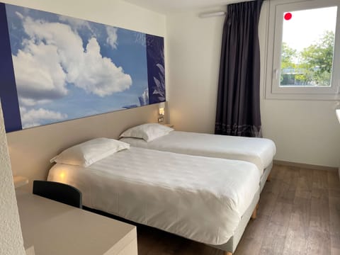 Standard Room, 2 Twin Beds | Memory foam beds, desk, laptop workspace, blackout drapes