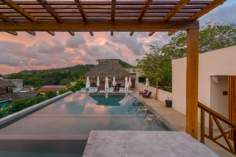 Outdoor pool, open 9:00 AM to 9:00 PM, free cabanas, sun loungers