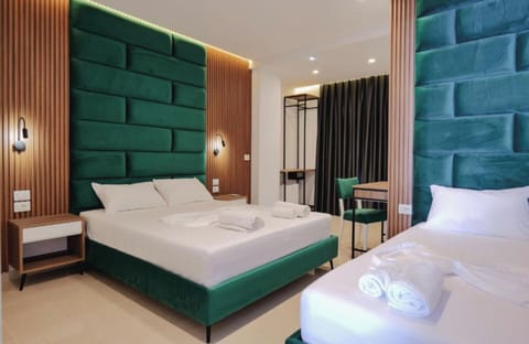 Deluxe Quadruple Room | Free WiFi, bed sheets