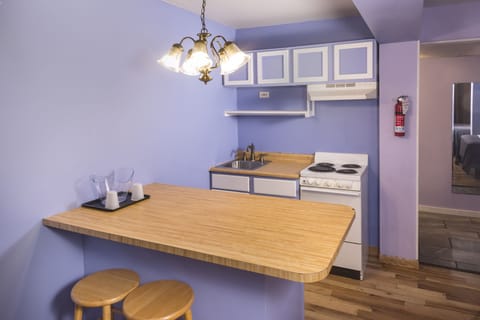 Deluxe Room, 2 Queen Beds, Kitchenette | Desk, laptop workspace, blackout drapes, free WiFi