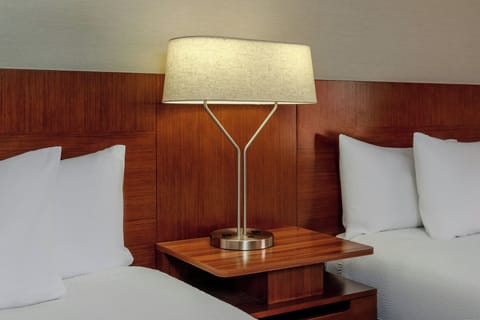 Desk, laptop workspace, iron/ironing board, travel crib