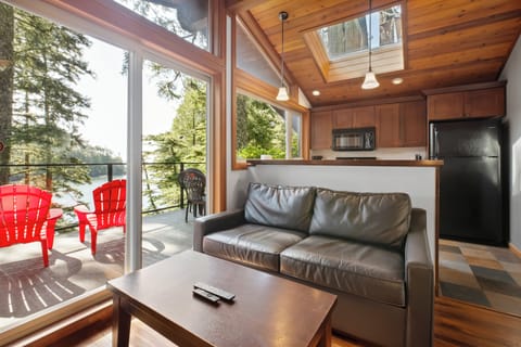 Cabin, 2 Bedrooms, Oceanfront (Nest) | Living area | 10-inch TV with cable channels