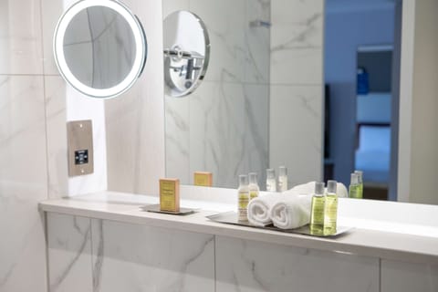 Shower, eco-friendly toiletries, hair dryer, towels