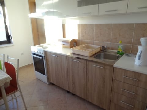 Apartment, 2 Bedrooms, Smoking, Balcony | Private kitchen | Fridge, electric kettle, cookware/dishes/utensils, dining tables