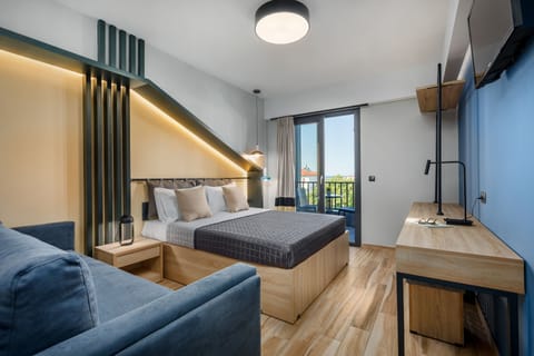 Family Room | Desk, laptop workspace, blackout drapes, soundproofing