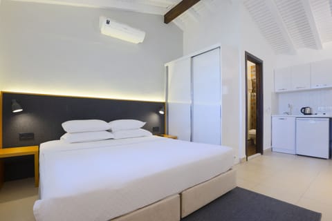 Comfort Bungalow, Private Bathroom, Garden View (Large Bungalow ) | Minibar, blackout drapes, soundproofing, iron/ironing board