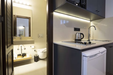 Premium Bungalow, Private Bathroom, Garden View | Private kitchen | Mini-fridge, eco-friendly cleaning products