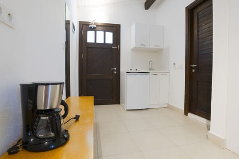 Comfort Bungalow, Private Bathroom, Garden View (Bungalow with Kitchen) | Minibar, blackout drapes, soundproofing, iron/ironing board