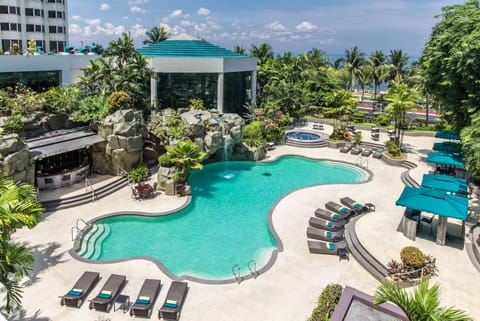 Outdoor pool, pool umbrellas, sun loungers