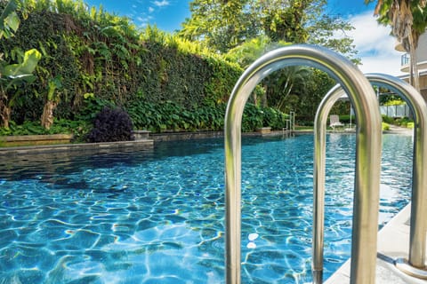 Outdoor pool, open 8:00 AM to 8:00 PM, pool umbrellas, sun loungers