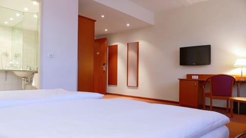 Desk, laptop workspace, blackout drapes, soundproofing