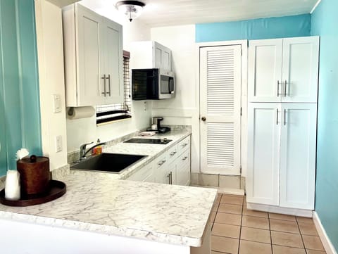 Deluxe Room, 2 Queen Beds, Kitchenette | Private kitchen | Fridge, microwave, coffee/tea maker