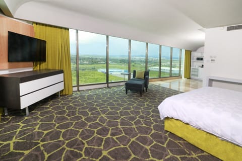 Suite, 1 King Bed (Walk-In Shower) | In-room safe, desk, blackout drapes, soundproofing