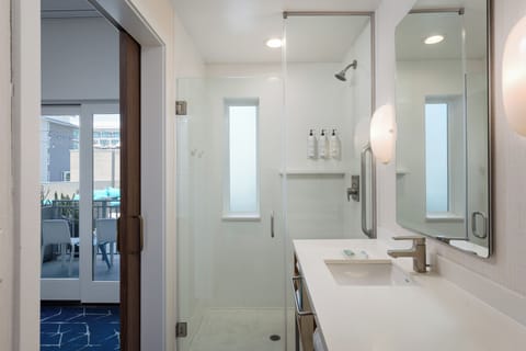 Eco-friendly toiletries, hair dryer, towels, soap