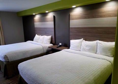 Deluxe Room, 2 Queen Beds, Smoking | Desk, iron/ironing board, free WiFi, bed sheets