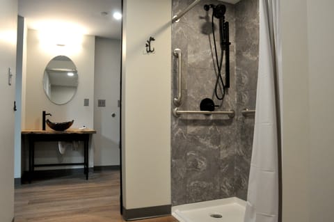 Standard Loft | Bathroom | Shower, hair dryer, towels, soap