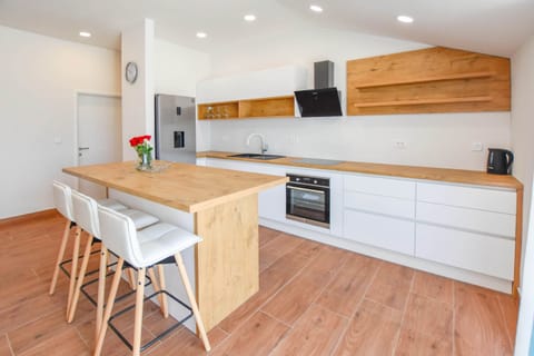 Apartment (A1) | Private kitchen | Fridge, microwave, oven, stovetop