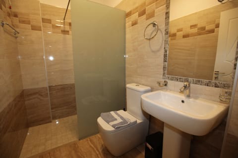 Standard Quadruple Room, Balcony | Bathroom | Shower, towels