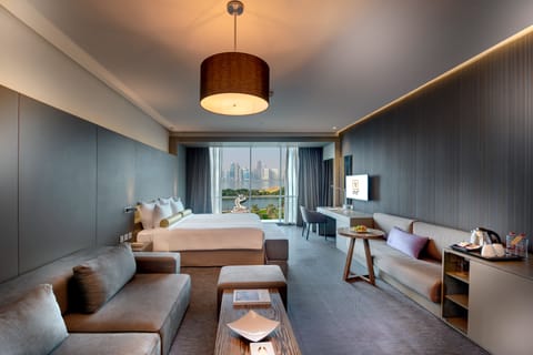 Premium Room, Lake View | Minibar, in-room safe, desk, blackout drapes