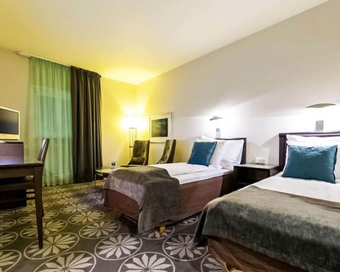 Desk, laptop workspace, iron/ironing board, cribs/infant beds