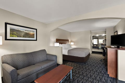 Desk, laptop workspace, blackout drapes, iron/ironing board