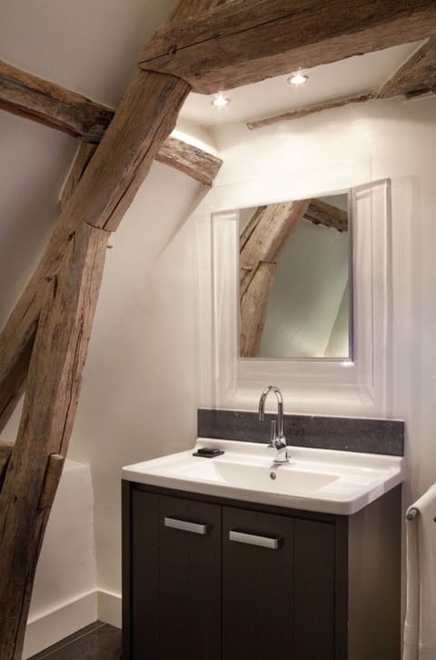 Suite, 1 King Bed with Sofa bed, Garden View | Bathroom | Designer toiletries, hair dryer, bathrobes, slippers