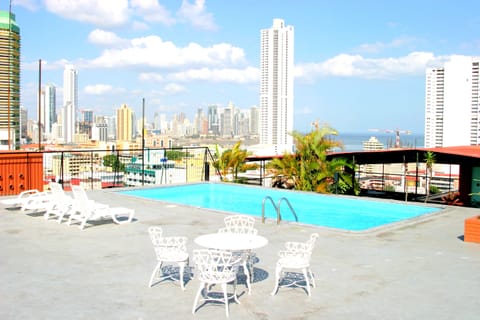 Outdoor pool, pool umbrellas, sun loungers