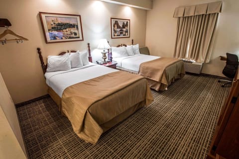 Pillowtop beds, desk, iron/ironing board, free cribs/infant beds