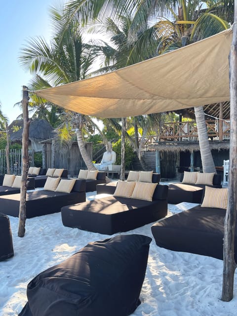 On the beach, white sand, sun loungers