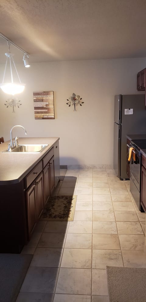 Condo, 1 King Bed with Sofa bed, Patio | Private kitchen | Fridge, microwave, oven, stovetop