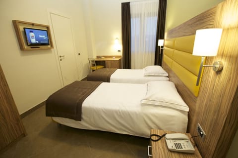 Down comforters, minibar, in-room safe, individually decorated