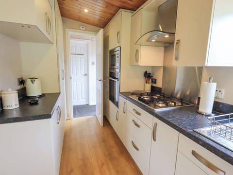 Fridge, electric kettle, toaster, cookware/dishes/utensils