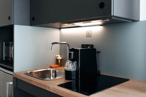 Mini-fridge, microwave, stovetop, espresso maker