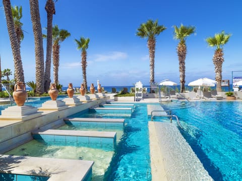 Indoor pool, 3 outdoor pools, open 10:00 AM to 6:30 PM, pool umbrellas